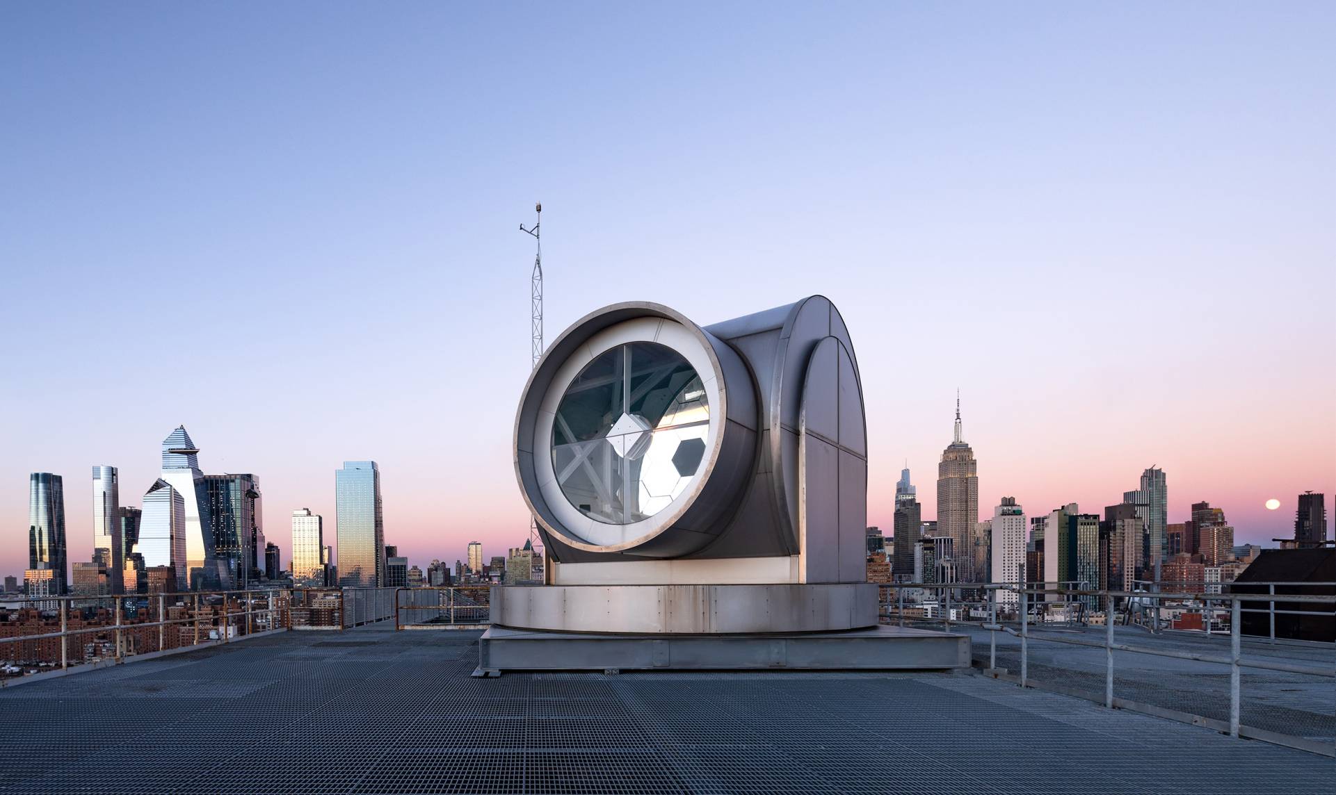 solar telescope on top of high rise in manhattan